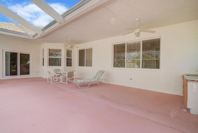 view of patio with ceiling fan