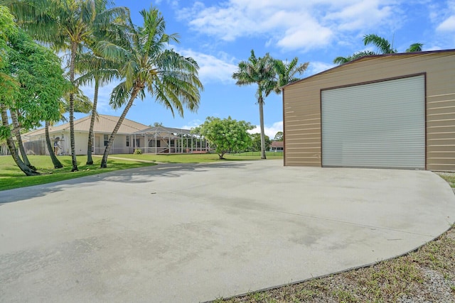 garage with a yard