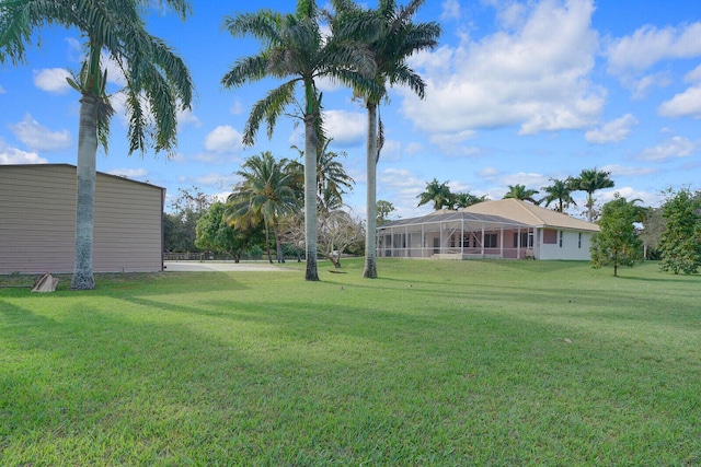 view of yard featuring a lanai