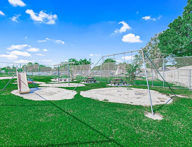 view of play area featuring a lawn