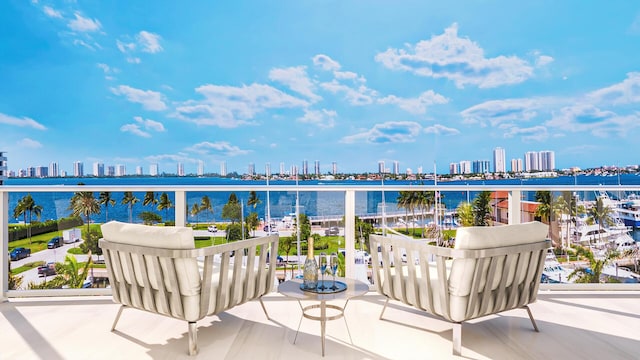 balcony featuring a water view