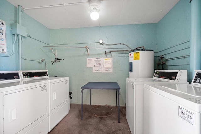 washroom with independent washer and dryer and electric water heater