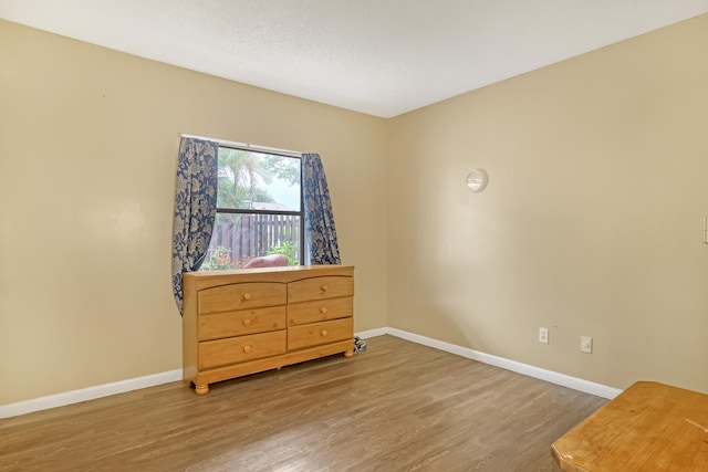 bedroom featuring hardwood / wood-style floors