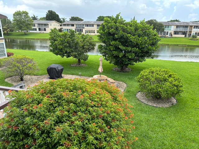 view of yard with a water view