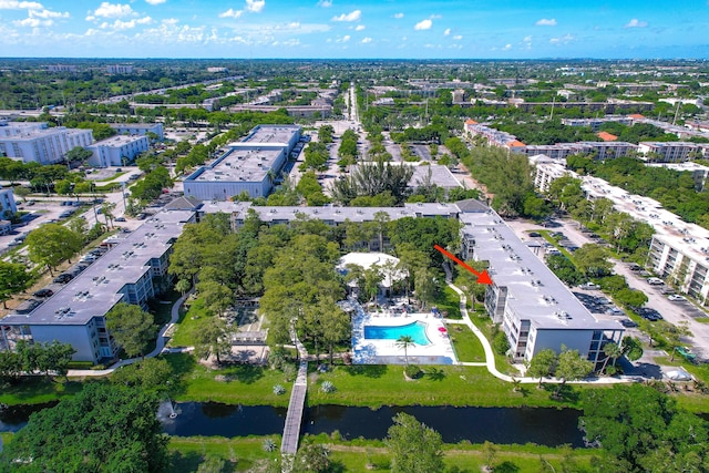 birds eye view of property featuring a water view