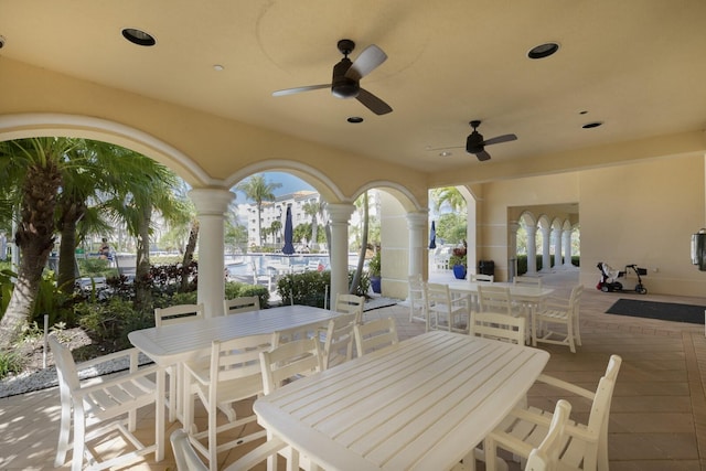 view of patio featuring ceiling fan