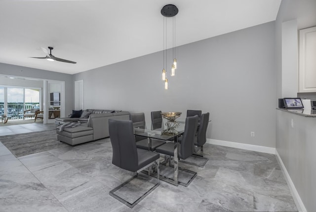 dining area with ceiling fan