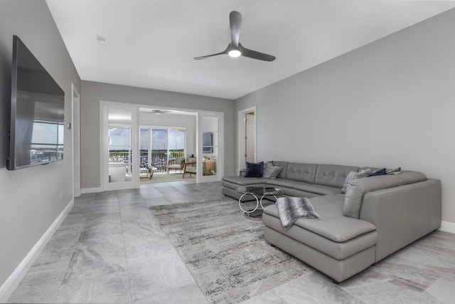 living room featuring ceiling fan