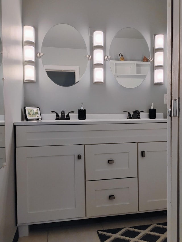 bathroom with dual vanity