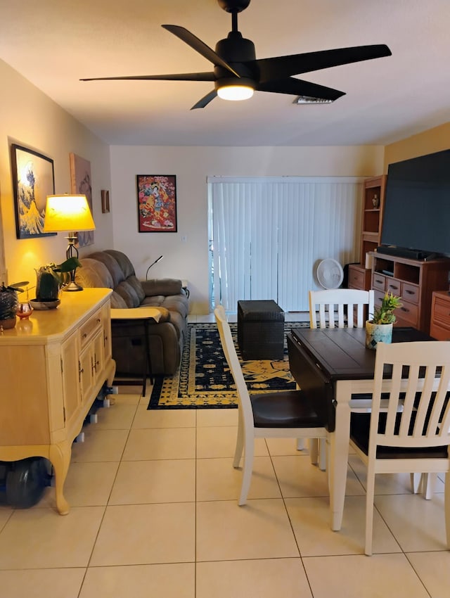 interior space featuring ceiling fan