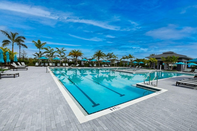 view of swimming pool featuring a patio