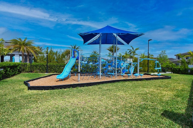 view of playground with a yard