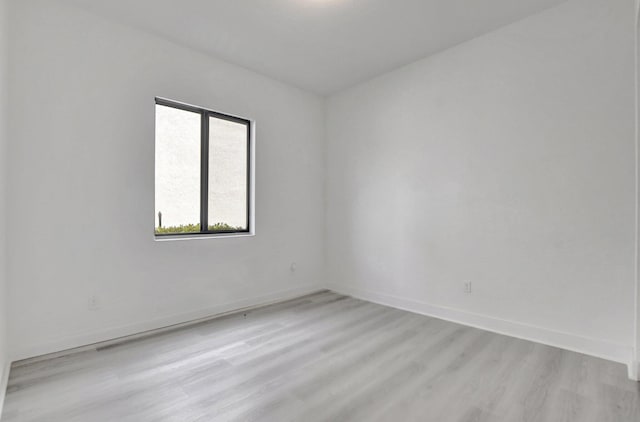 unfurnished room featuring light hardwood / wood-style floors