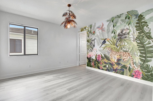 unfurnished room featuring wood-type flooring