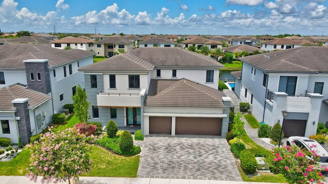 view of front of home with a garage