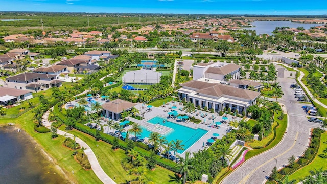 birds eye view of property featuring a water view