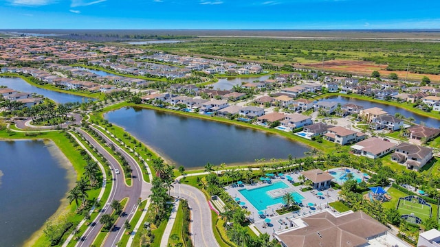 bird's eye view with a water view