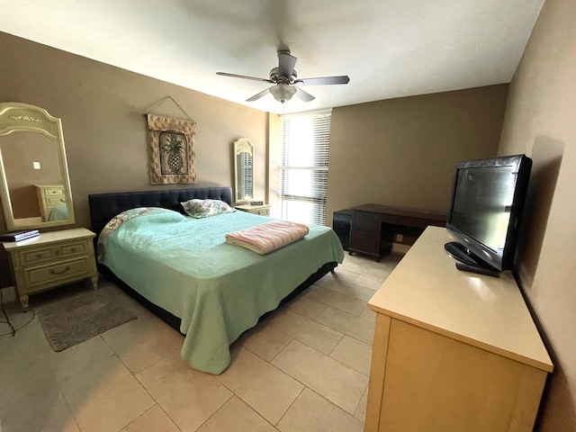 bedroom with light tile patterned flooring and ceiling fan