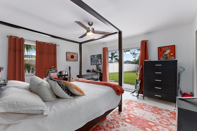 bedroom with ceiling fan, access to exterior, and light tile patterned floors