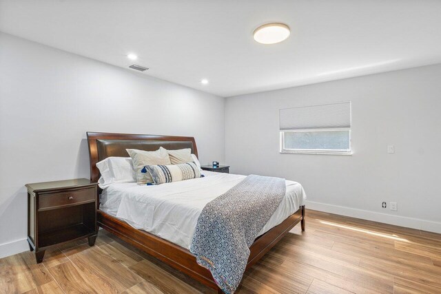 bedroom featuring light wood-type flooring