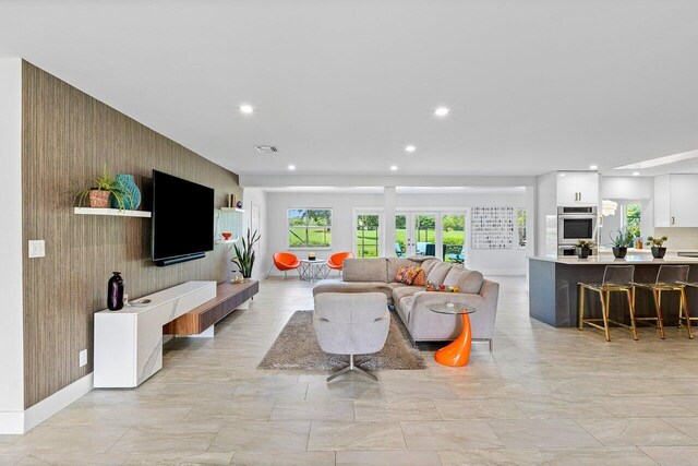 living room with light tile patterned floors