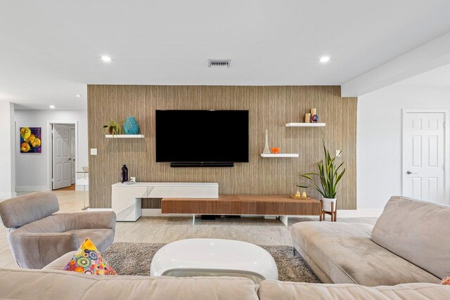 living room with light hardwood / wood-style floors