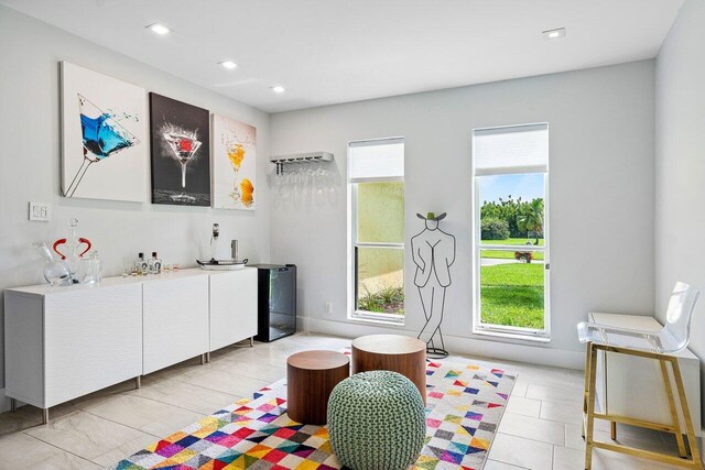 playroom with light tile patterned floors