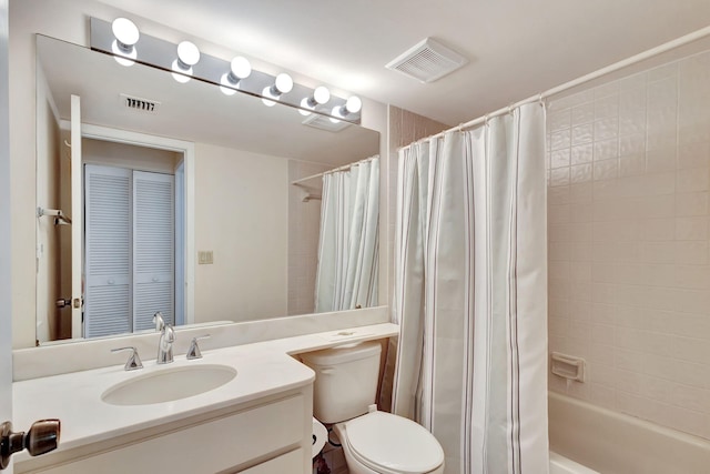 full bathroom featuring toilet, vanity, and shower / tub combo with curtain