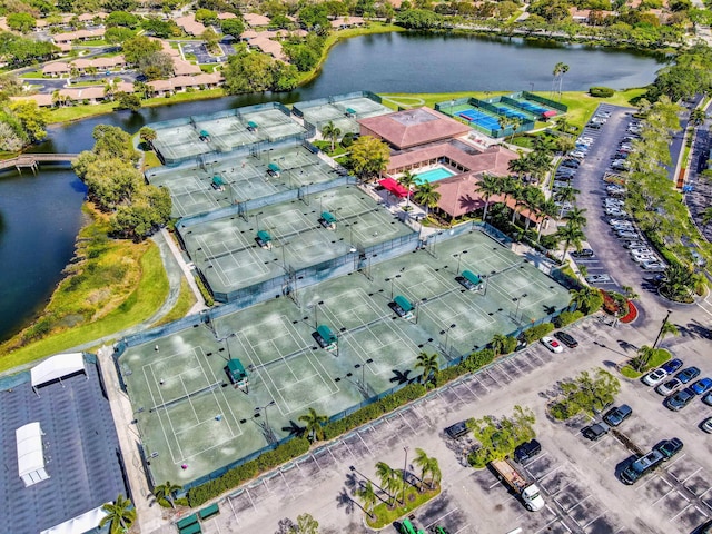 birds eye view of property featuring a water view