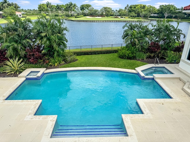 view of swimming pool featuring an in ground hot tub