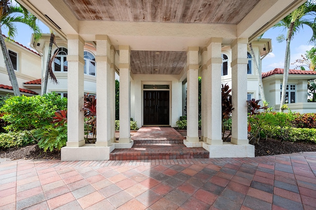 doorway to property with covered porch