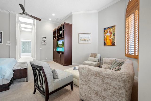 living room featuring wood walls, ceiling fan, ornamental molding, and light colored carpet