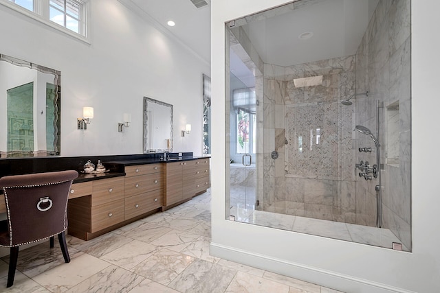 bathroom featuring tiled shower, dual vanity, tile patterned floors, and crown molding