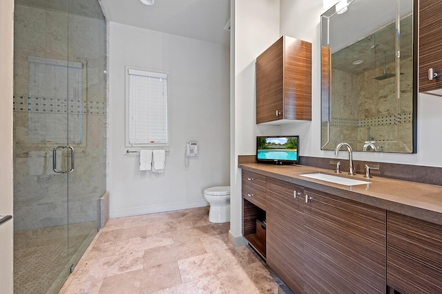 bathroom featuring an enclosed shower, vanity, tile patterned floors, and toilet