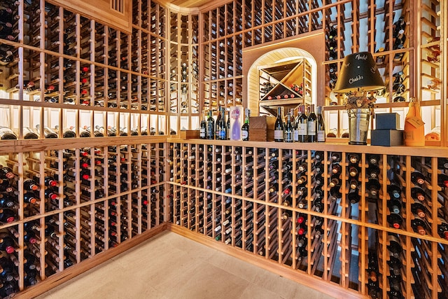 wine area with tile patterned flooring