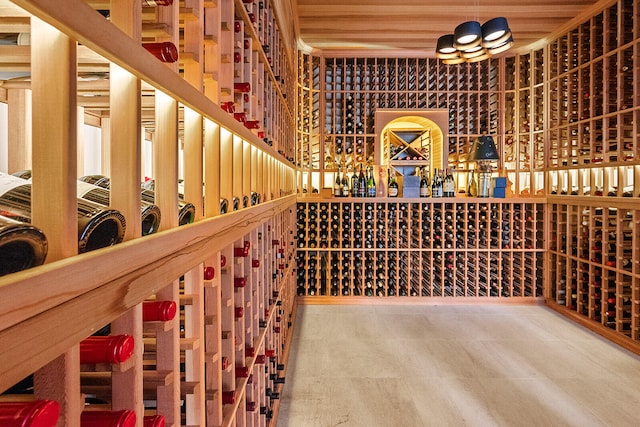 wine room featuring wooden ceiling