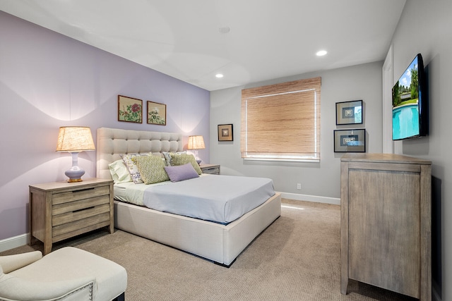 bedroom with light colored carpet