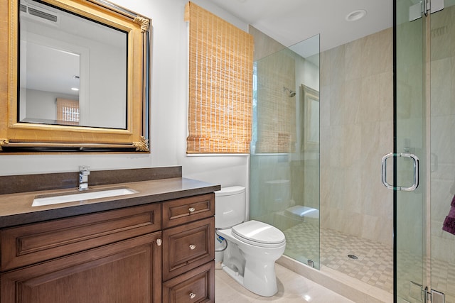 bathroom with a shower with door, toilet, and vanity