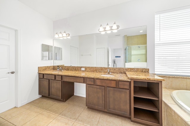 bathroom with tile patterned floors, vanity, and plus walk in shower