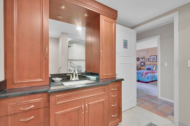 bathroom featuring vanity and tile patterned floors