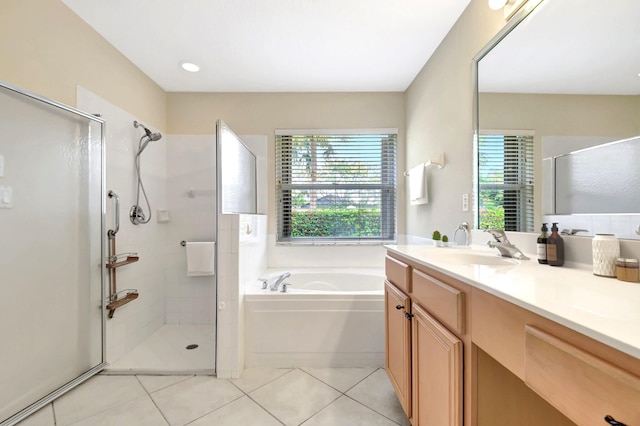 8278 Duomo Cir, Boynton Beach, FL 33472 - full bathroom featuring a shower stall, a garden tub, vanity, and tile patterned floors