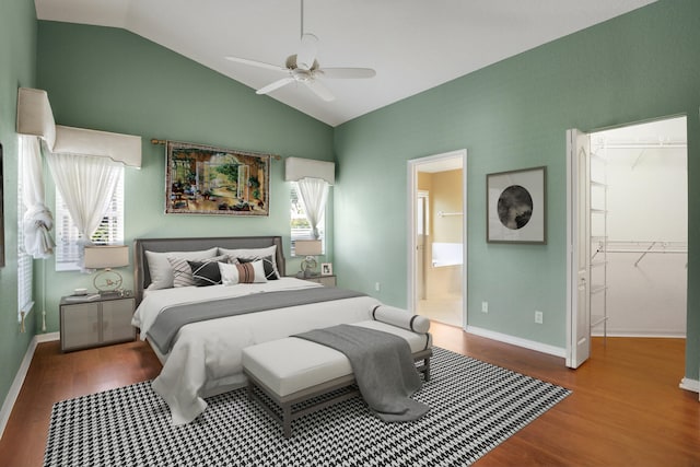 bedroom with multiple windows, ceiling fan, and hardwood / wood-style flooring