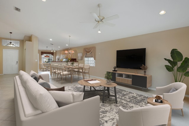 tiled living room featuring ceiling fan