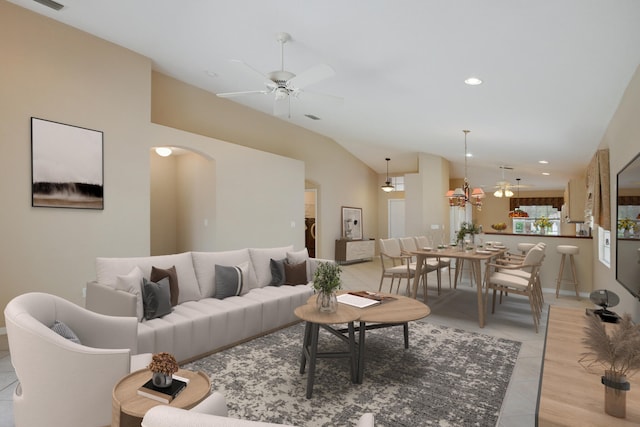 living room with vaulted ceiling, light tile patterned floors, and ceiling fan