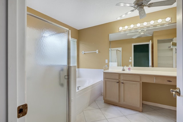 bathroom with tile patterned flooring, vanity, ceiling fan, and independent shower and bath