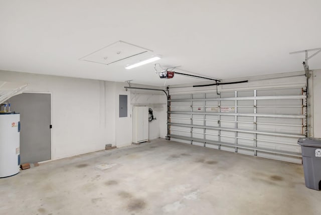 garage featuring a garage door opener, electric panel, and electric water heater