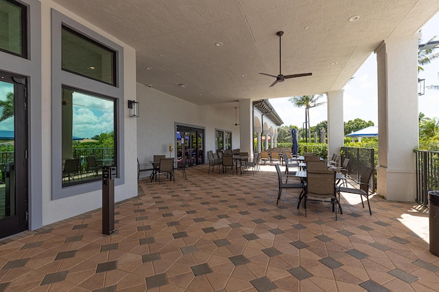 view of patio featuring ceiling fan