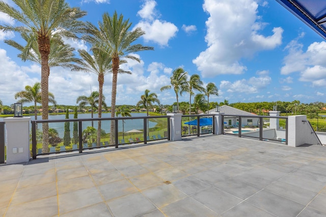 view of patio / terrace featuring a water view