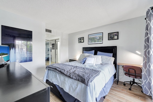 bedroom with a textured ceiling