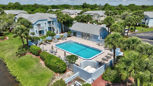 view of swimming pool featuring a patio area